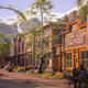 A screenshot from Life Is Strange: True Colors showing the town of Haven Springs' Main Street.
